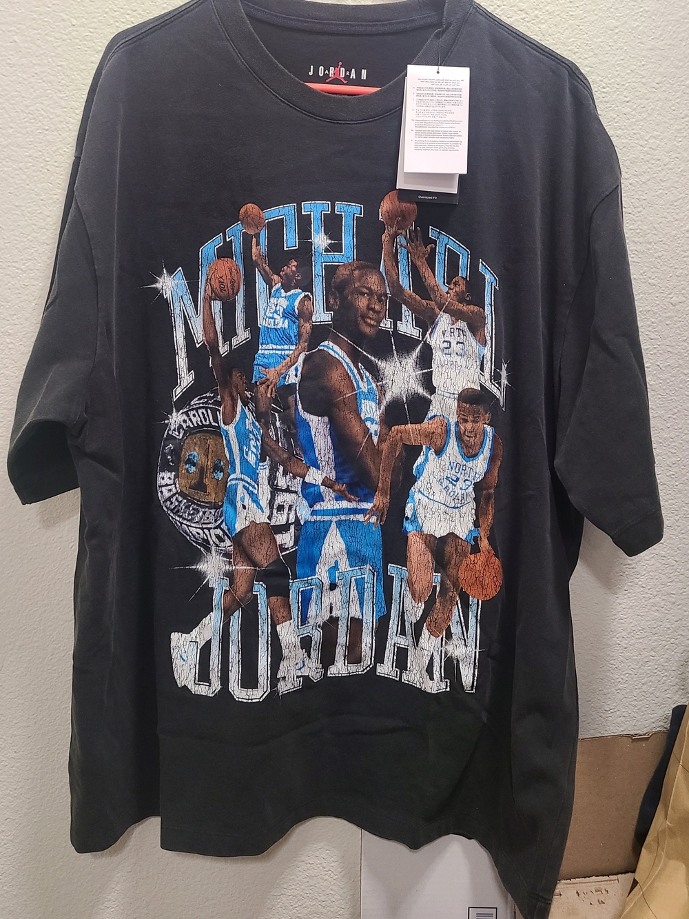 Jordan Black Tee with Blue and White North Carolina Basketball Graphics